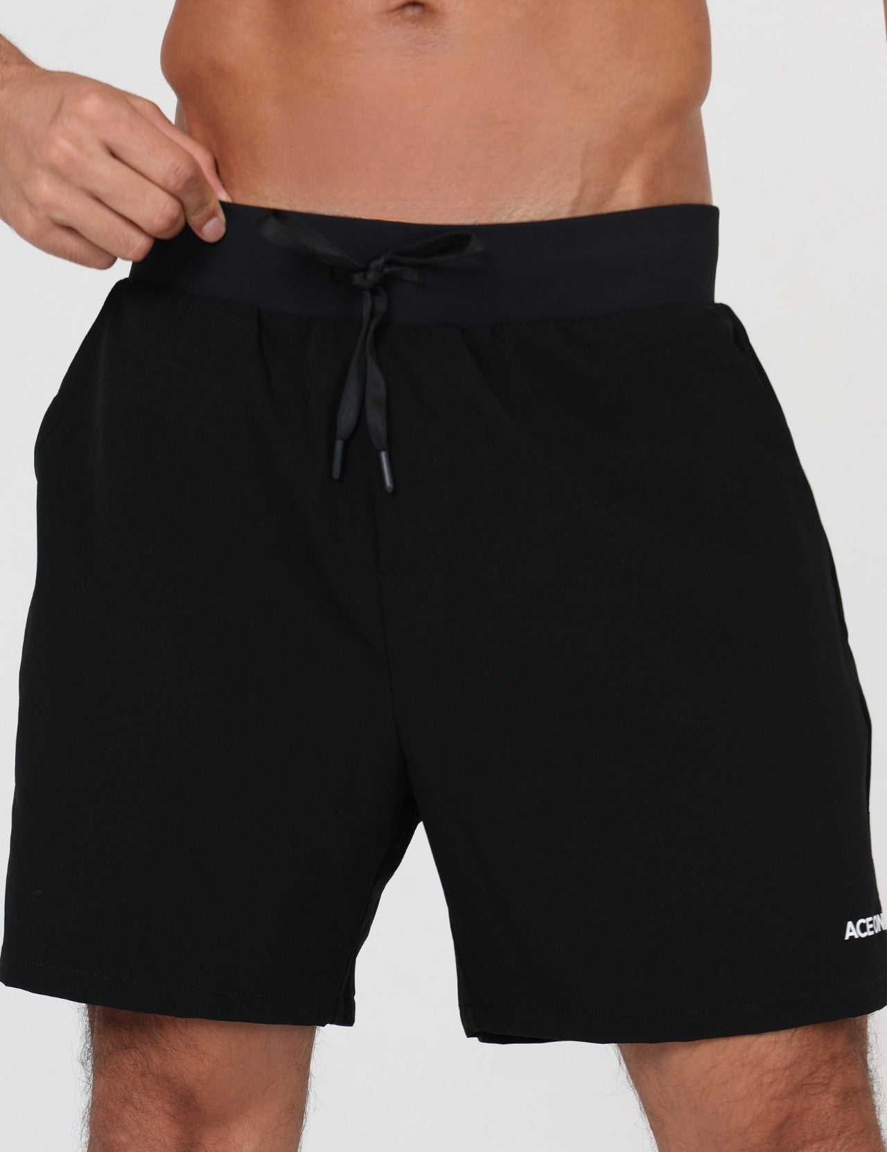 Ace One Black men's active short – stretch activewear top with clean design, perfect for padel tennis and gym