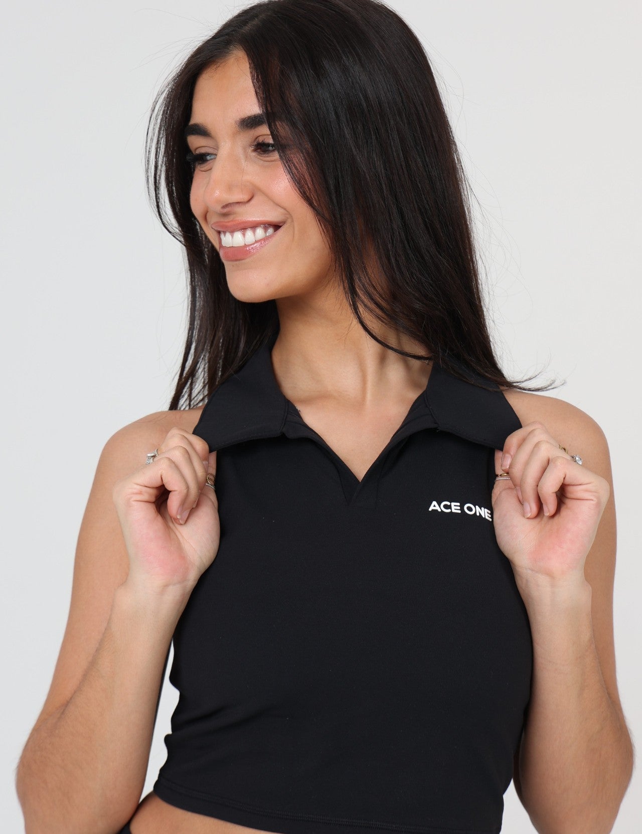 Ace One Women's black active tank top  – elegant and functional skirt for padel, tennis or active lifestyle.