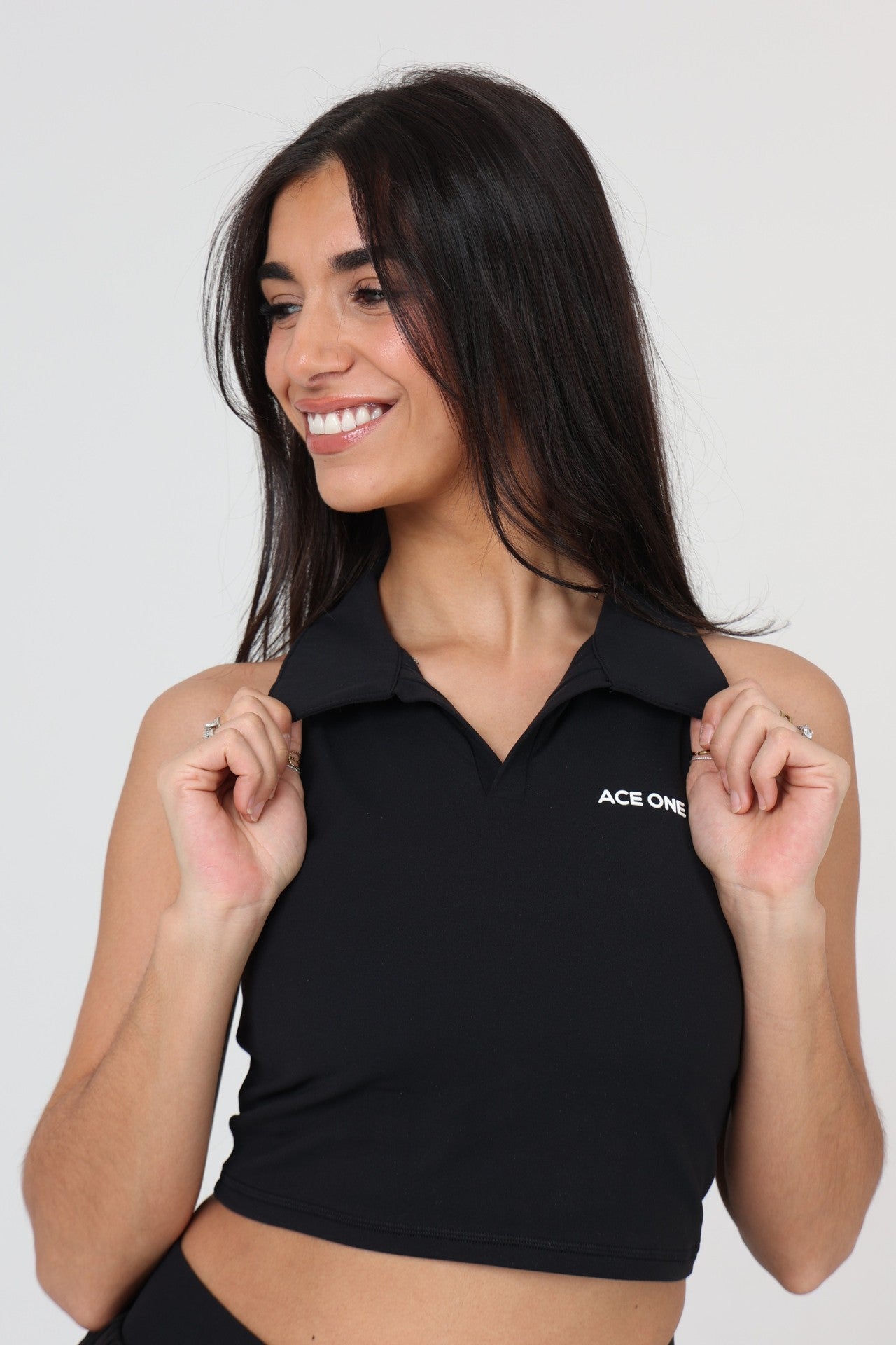 Ace One Women's black active tank top  – elegant and functional skirt for padel, tennis or active lifestyle.