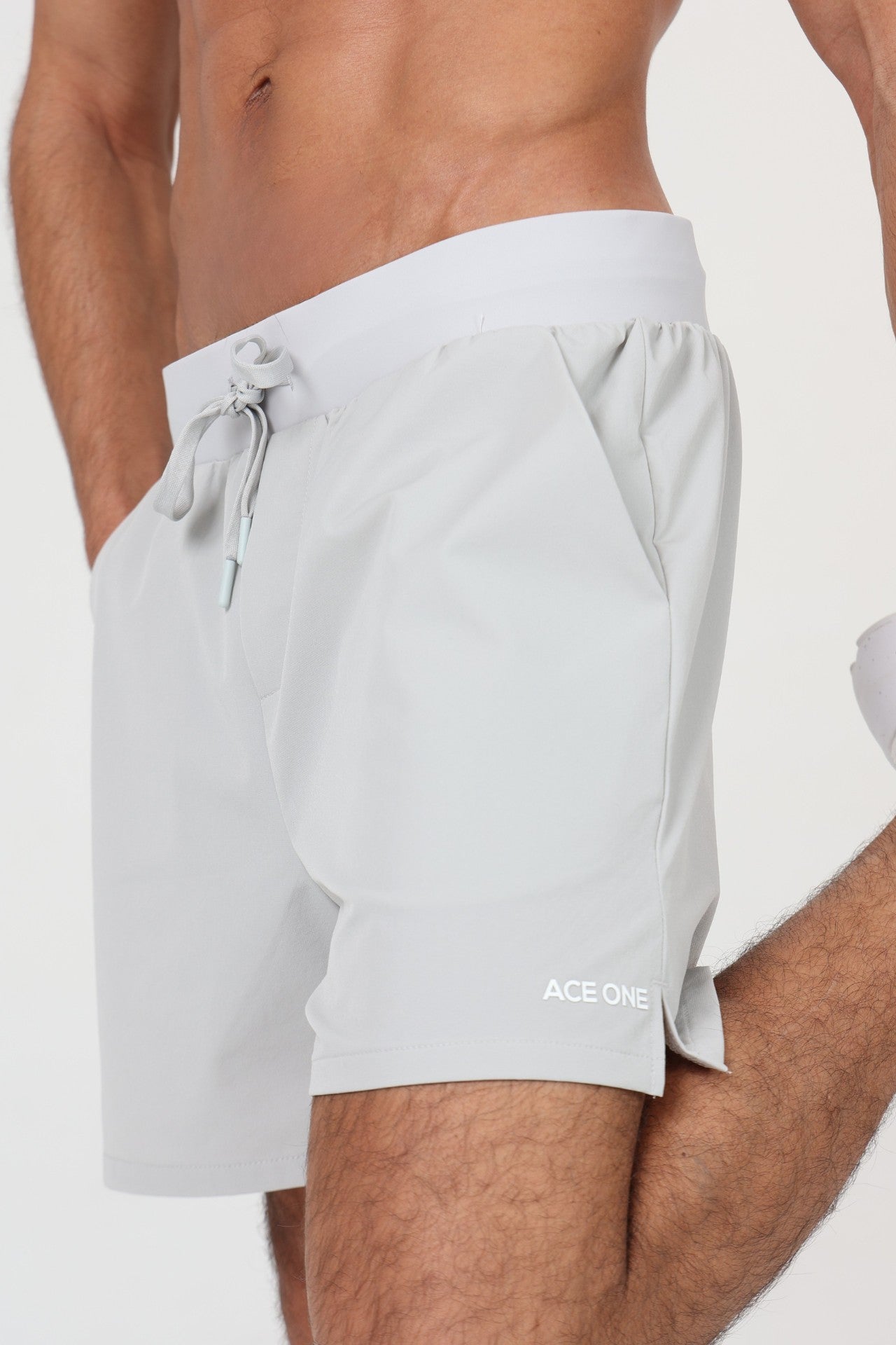 Ace One Men's grey sports shorts comfortable and technical sportswear designed for mobility and performance.