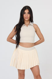 Women's beige pleated tennis and padel set – elegant and functional skirt for padel, tennis or active lifestyle.
