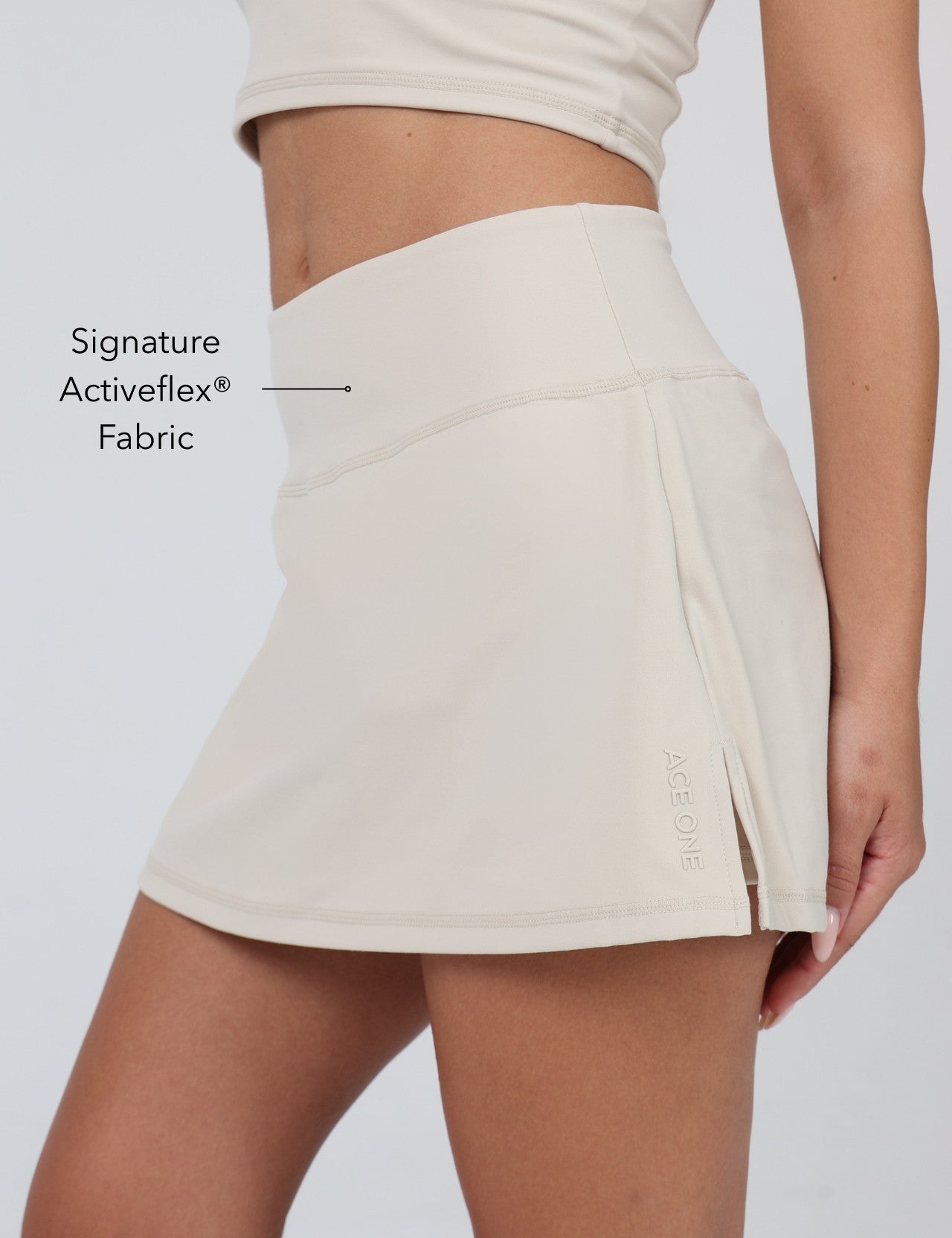 Ace One Women's beige active skort – lightweight sports skirt with built-in shorts, ideal for padel and tennis