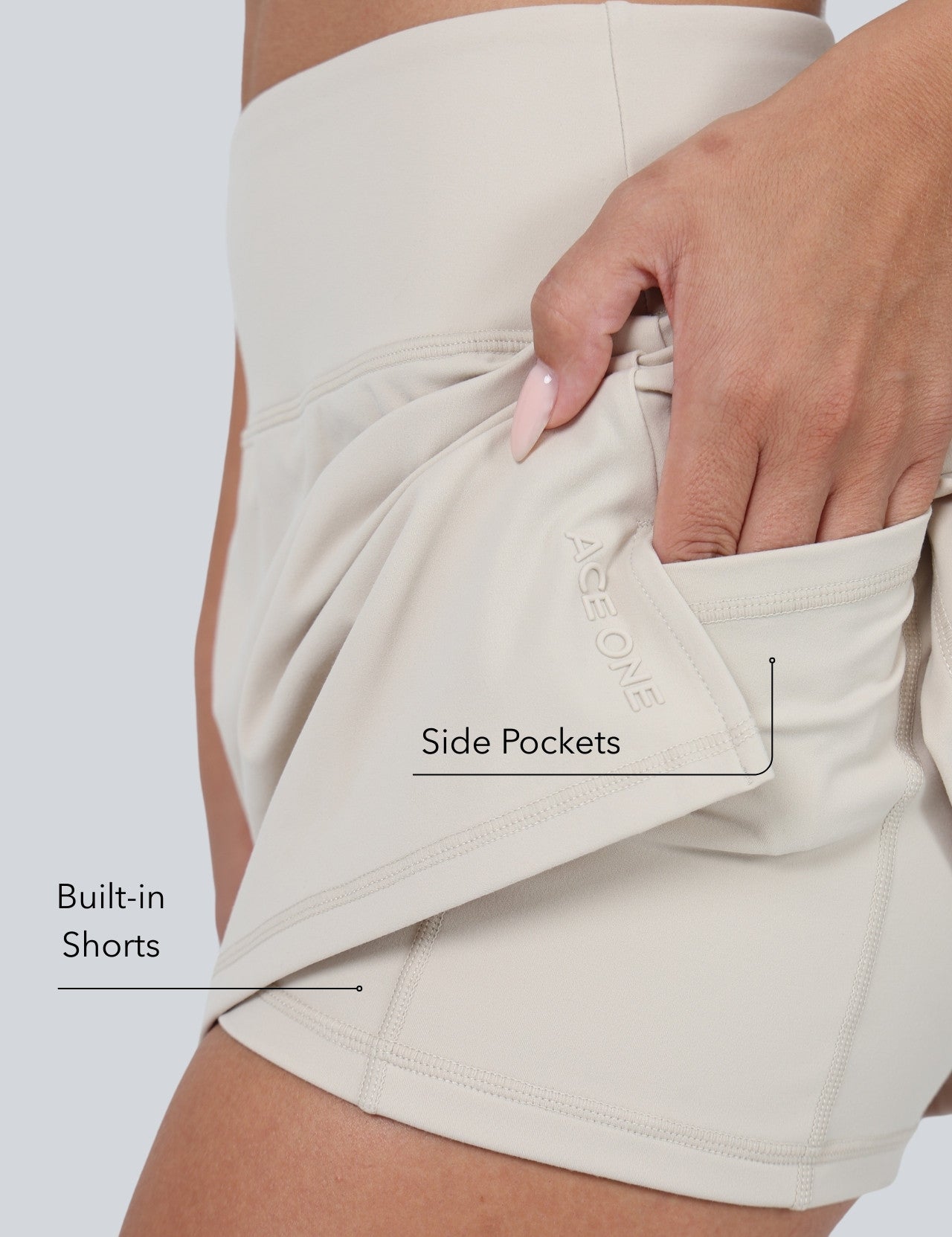 Ace One Women's beige active skort – lightweight sports skirt with built-in shorts, ideal for padel and tennis