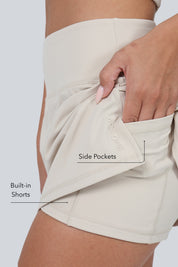 Ace One Women's beige active skort – lightweight sports skirt with built-in shorts, ideal for padel and tennis