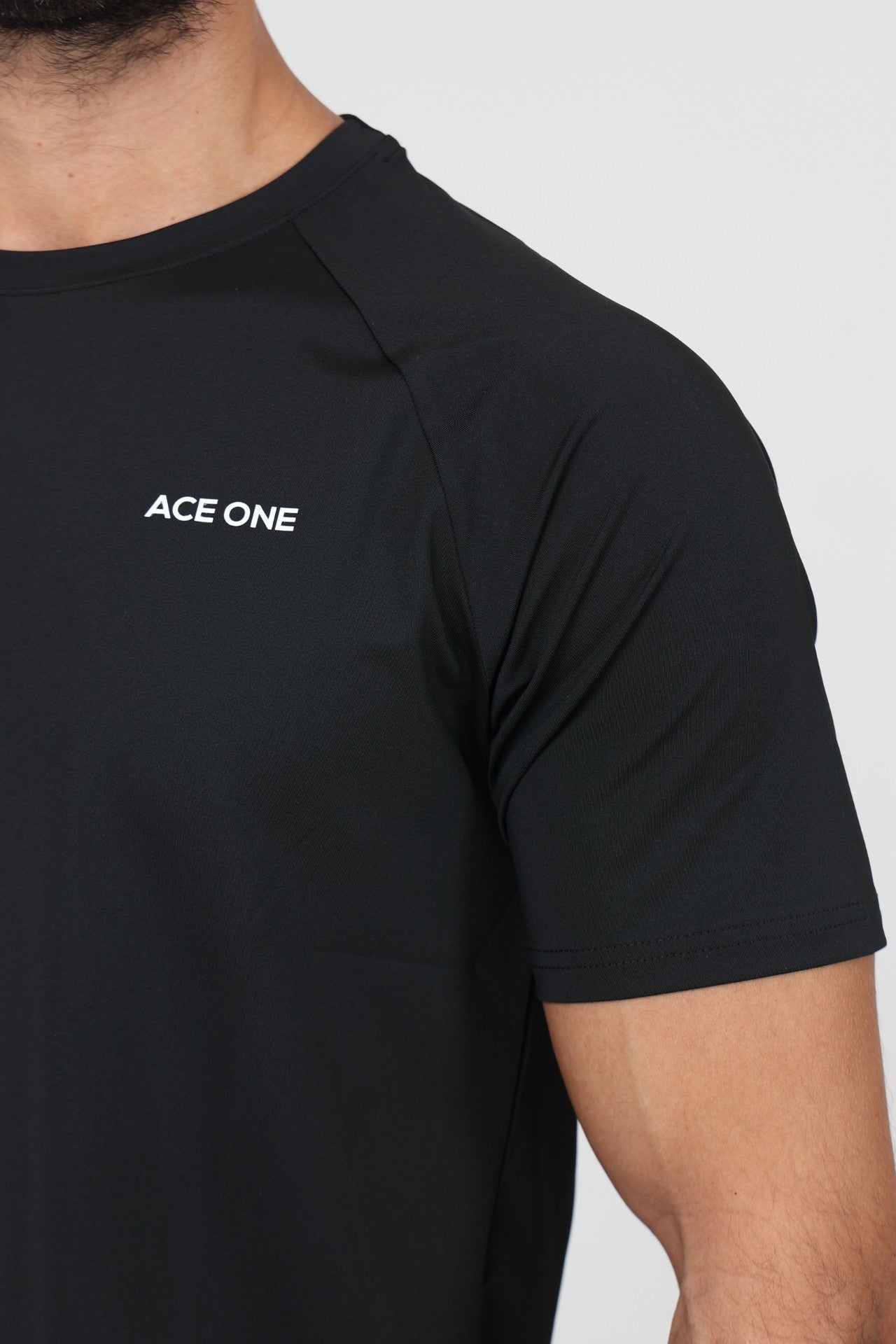 Ace One Black men's active t-shirt – stretch activewear top with clean design, perfect for court and gym