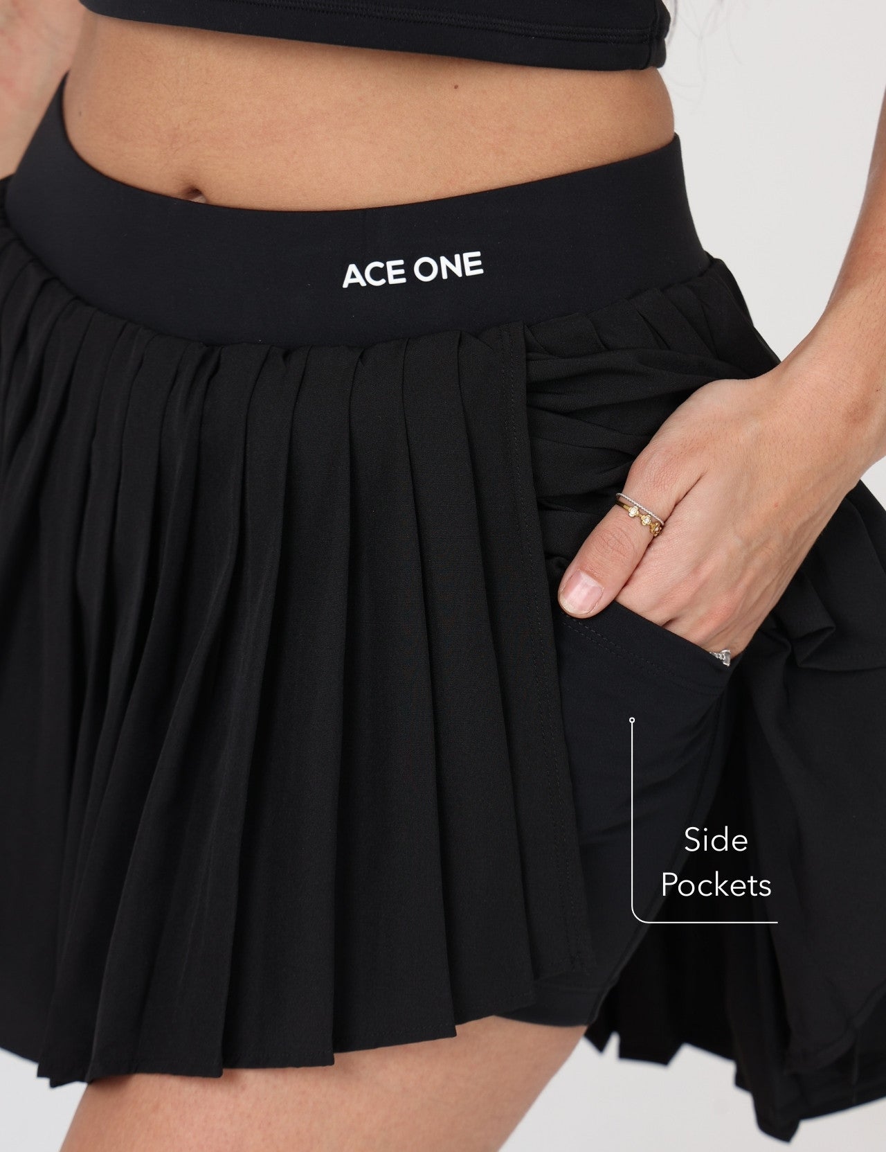Women's black tennis skirt – elegant and functional skirt for padel, tennis or active lifestyle.