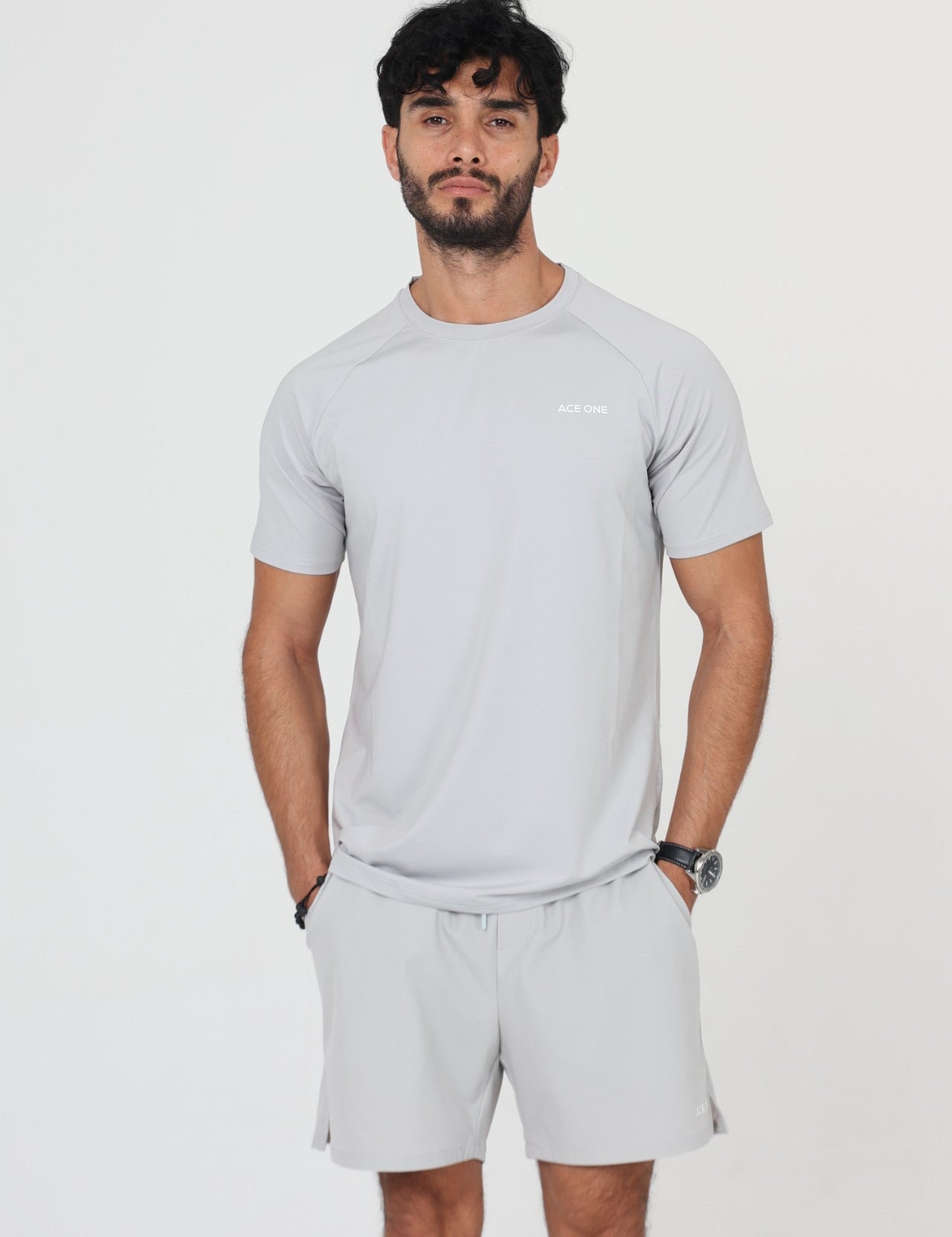 Ace One Men's grey sports set with fitted t-shirt and short – comfortable and technical sportswear designed for mobility and performance.