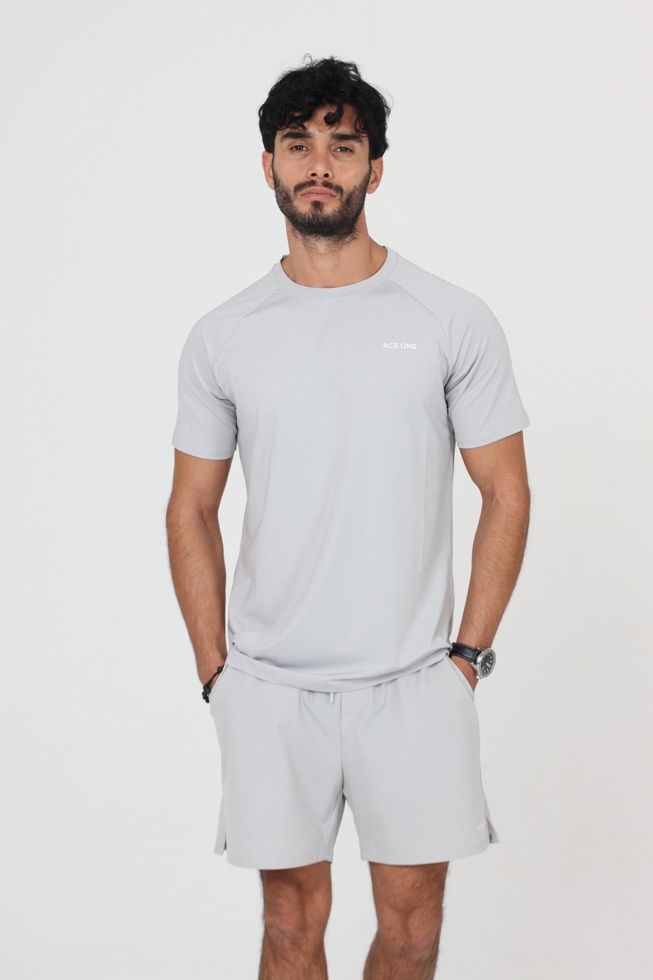 Ace One Men's grey sports set with fitted t-shirt and short – comfortable and technical sportswear designed for mobility and performance.