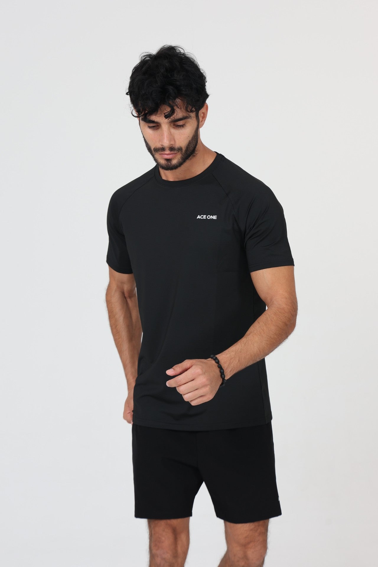 Ace One Black active set with fitted t-shirt and short – stretch activewear top with clean design, perfect for court and gym