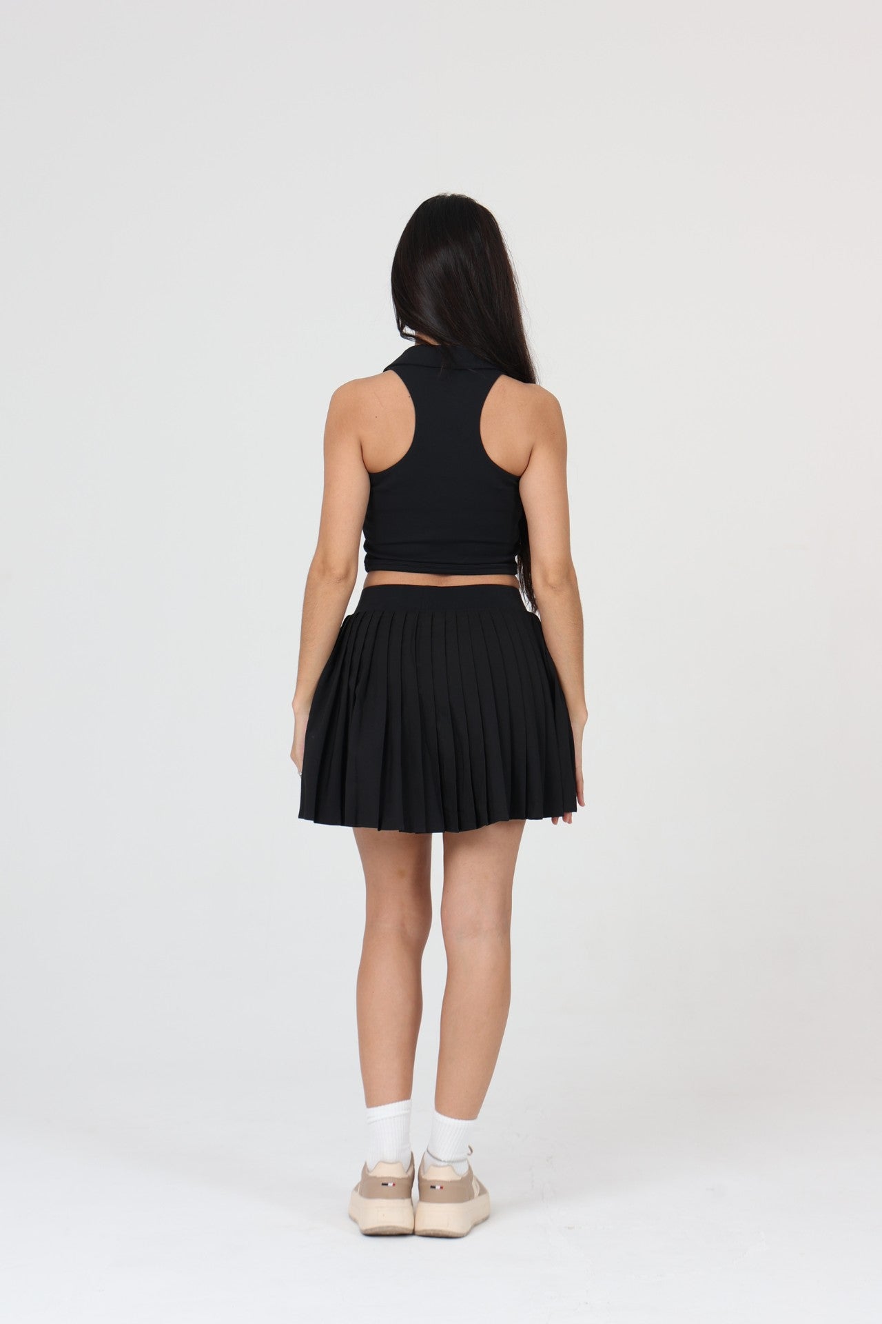 ACE ONE black padel skirt back view showing pleats